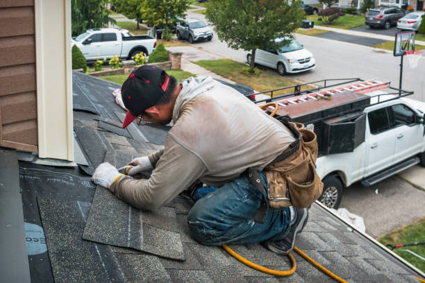 Professional Emergency Roof Repair technician working in Kent, OH